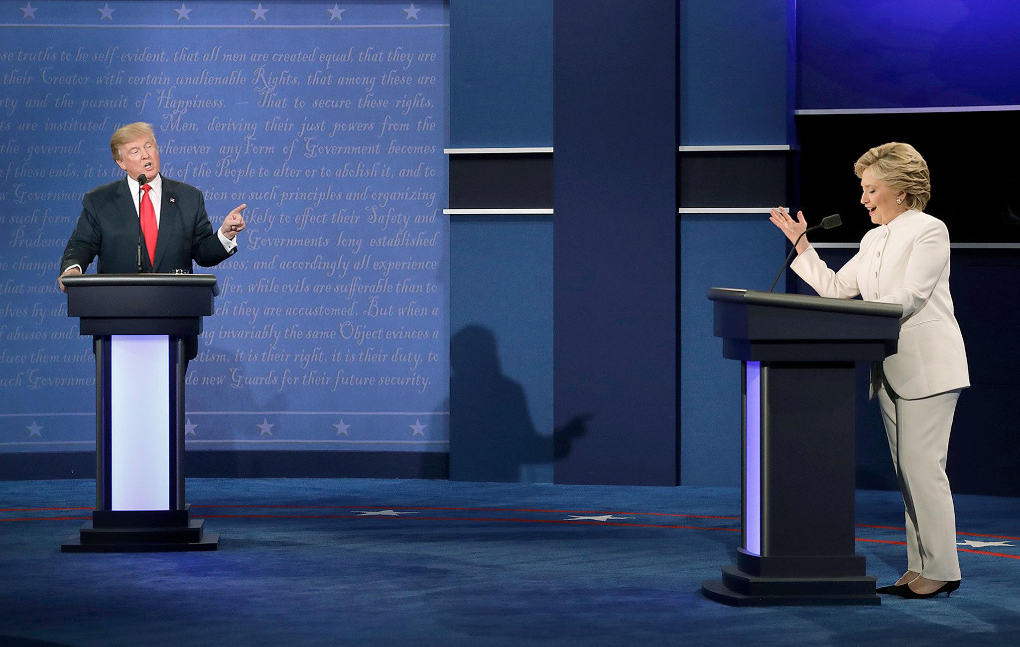 Democratic presidential nominee Hillary Clinton and Republican presidential nominee Donald Trump speak during the third presidential debate at UNLV in Las Vegas on Wednesday. (AP Photo/David Goldman)