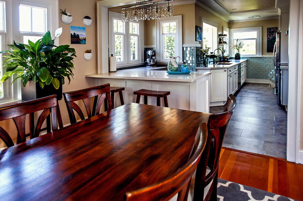 The Keenans’ kitchen extends nicely into the dining room. (Dan Bates/The Herald)
