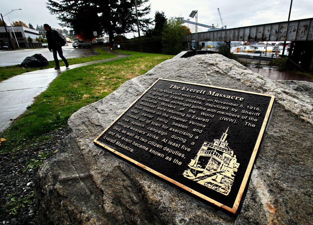 At the junction of Bond Street, Federal Avenue and Hewitt Avenue, a stone-mounted memorial plaque provides a brief description of the Everett Massacre, which occurred at the City Dock just west of this spot on Nov. 5, 1916. (Dan Bates / The Herald)

