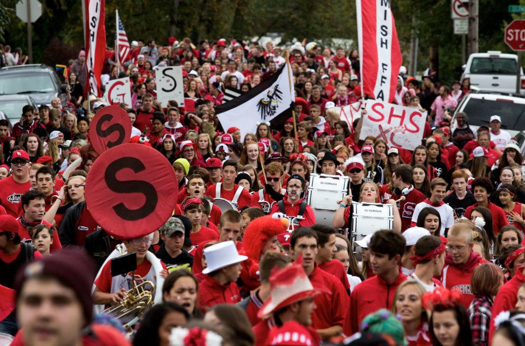 Some 1,500 Snohomish High School students walk in the annual Serpentine Parade on Friday in downtown Snohomish. (Andy Bronson / The Herald)
