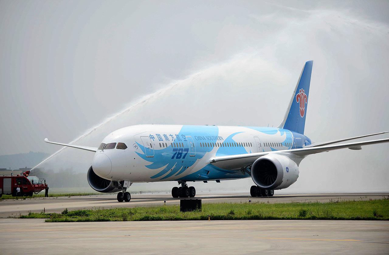 A Boeing 787 passenger jet operated by China Southern Airlines is welcomed with a spray of water after its arrival in Guangzhou in 2013. This was the first Boeing 787 Dreamliner obtained by China. (Xinhua/Wang Jianhua)