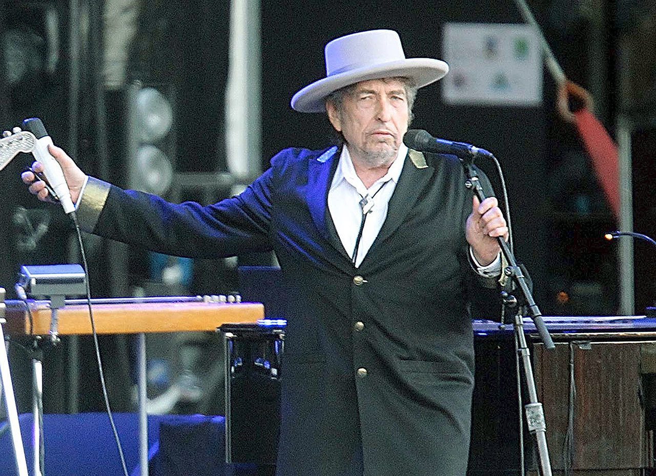 U.S. singer-songwriter Bob Dylan performing at Les Vieilles Charrues Festival in Carhaix, France, in 2012. Dylan won the 2016 Nobel Prize in literature, announced Thursday. (AP Photo/David Vincent, File)