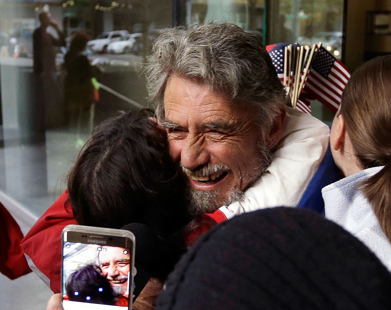 Defendant Neil Wampler is greeted by supporters as he leaves federal court in Portland, Oregon, on Thursday. (AP Photo/Don Ryan)
