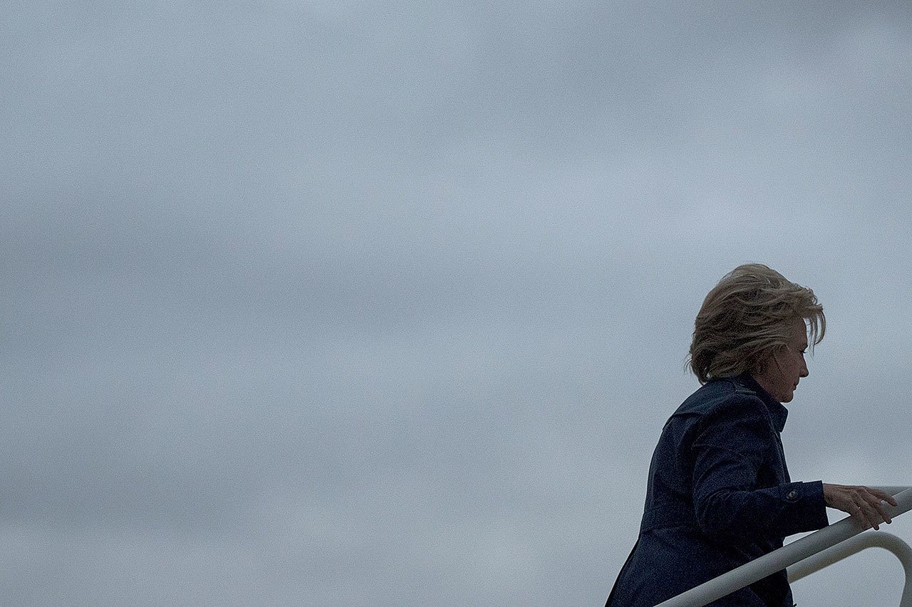 Democratic presidential nominee Hillary Clinton boards her campaign plane in Cleveland, New York, on Friday to travel to White Plains, New York. (AP Photo/Andrew Harnik)