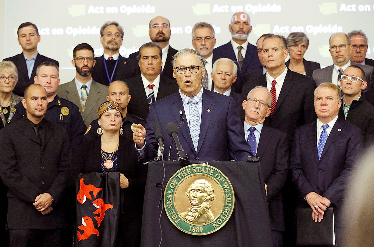 Washington Gov. Jay Inslee speaks Friday at the University of Washington Medical Center in Seattle. Inslee announced an executive order to fight the rising abuse of opioids in Washington. (AP Photo/Ted S. Warren)