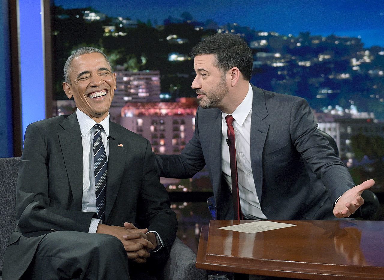 President Barack Obama talks with Jimmy Kimmel between taping segments of “Jimmy Kimmel Live!” at the El Capitan Entertainment Center in Los Angeles on Monday. (AP Photo/Susan Walsh)