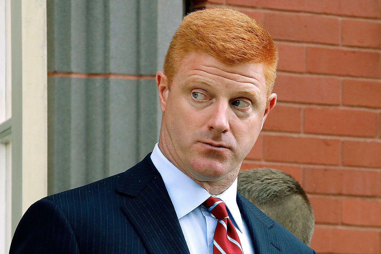Former Penn State University assistant football coach Mike McQueary leaves the Centre County Courthouse Annex for lunch in Bellefonte, Pennsylvania, on Monday, Oct. 17. A civil trial that’s set to begin will determine if Penn State should pay for a claim it mistreated the former assistant coach who provided key evidence used to convict child molester Jerry Sandusky. (AP Photo/Gene J. Puskar)
