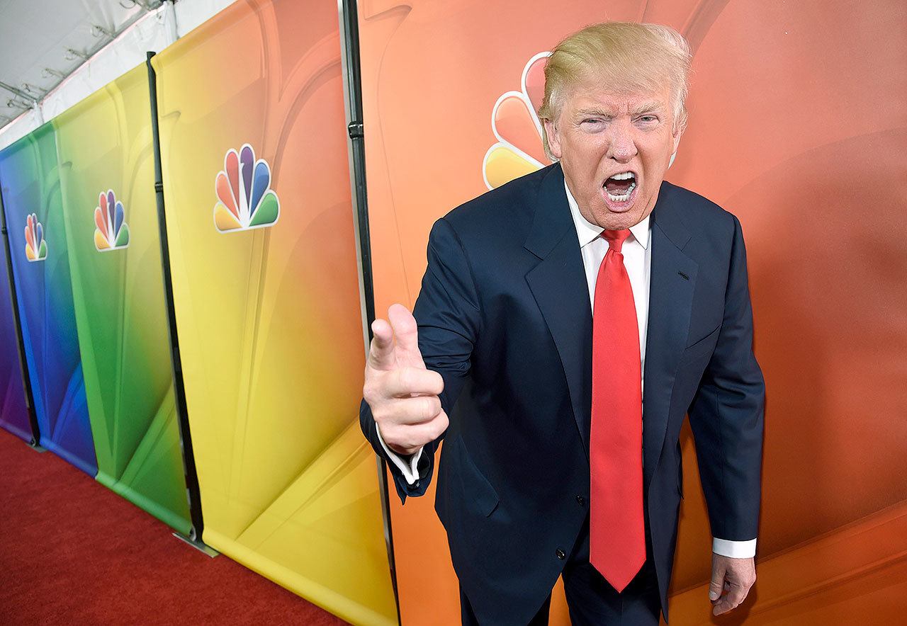 In 2015,, Donald Trump, host of the reality television series “The Celebrity Apprentice,” poses for photographers. In his years on the “The Apprentice,” Trump repeatedly demeaned women with sexist language, according to show insiders, who said he rated female contestants by the size of their breasts and talked about which ones he’d like to have sex with. (Chris Pizzello/Invision/AP, File)