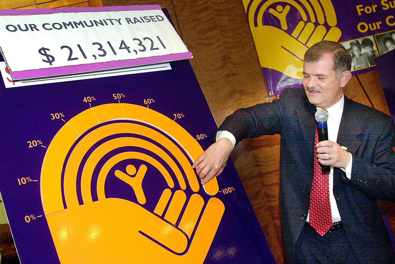 In this 2001 photo, A. Dale Cannady, the 2001 United Way campaign chairman in Richmond, Virginia, announces the total raised during the annual fund raising at a press conference at the Richmond Center in Richmond. (Clement Britt/Richmond Times-Dispatch via AP, File)
