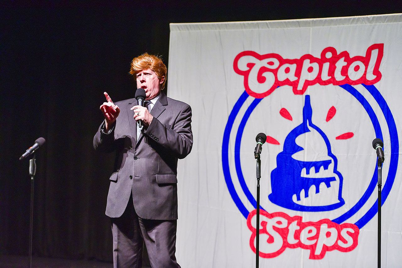 A Capitol Steps cast member playing Donald Trump sings “Shut Up and Vote For Me.”