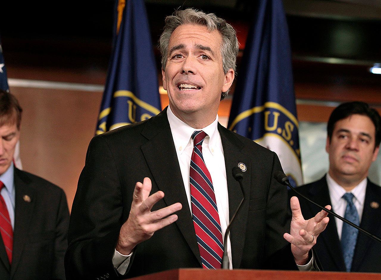 In this 2011 photo, former U.S. Rep. Joe Walsh, R-Ill., gestures during a news conference on Capitol Hill in Washington. Walsh tweeted on Oct. 26, that he plans plans to grab his musket if GOP nominee Donald Trump loses the presidential election. Walsh later said on Twitter that he was referring to “acts of civil disobedience.” (AP Photo/Carolyn Kaster, File)