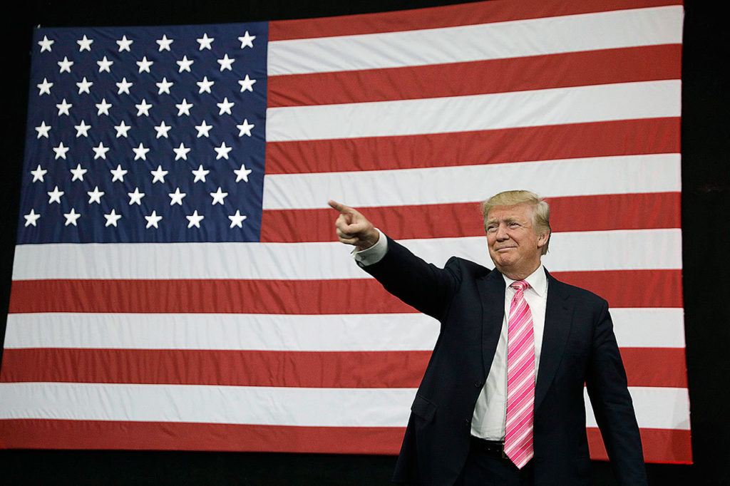 Republican presidential candidate Donald Trump takes the stage Saturday at a rally in Manheim, Pennsylvania. (AP Photo/John Locher)
