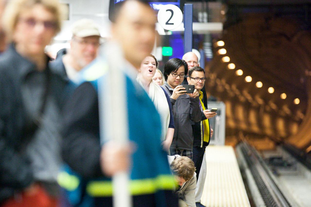 Riders gather to board light rail at the Capitol Hill Station in Seattle during the station’s first day in March. (Jeremy Dwyer-Lundgren / Seattle Weekly)
