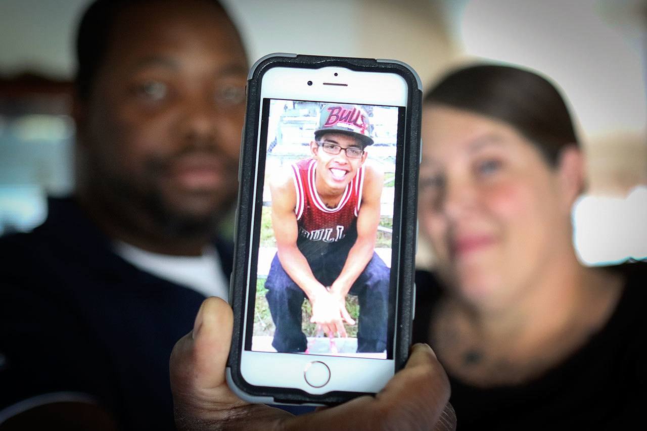 Steve and Sabrie Taylor were awakened with a phone call while on a short trip out of town last year with the news that their 19-year-old son, DeJohn Ward, had died by suicide. An average of two youths die by suicide each week in Washington. (Kevin Clark / The Herald)