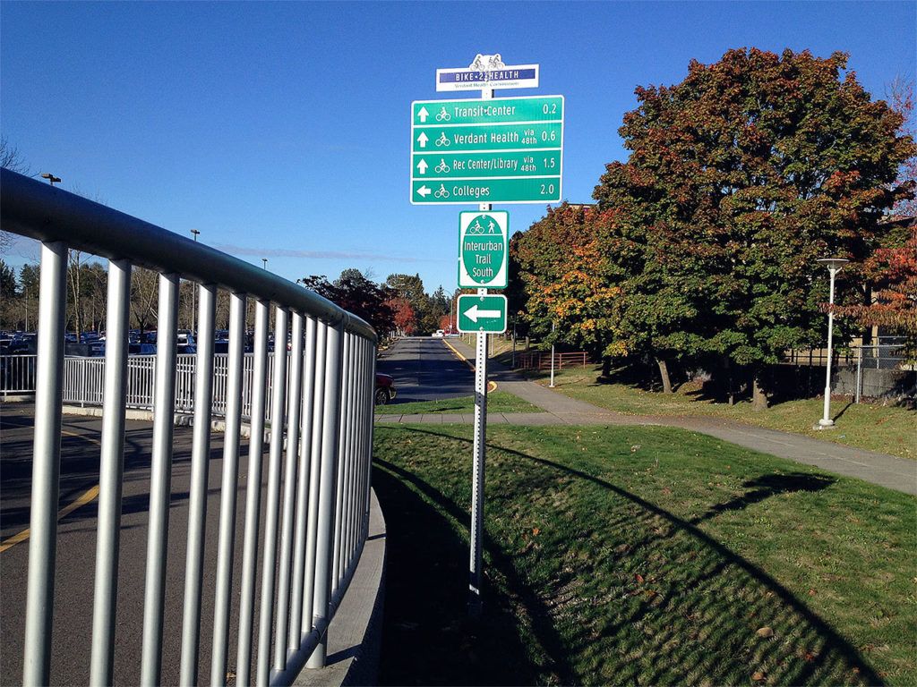 One of the improvements in the Bike 2 Health project is installing “way-finding” signs, like this one installed recently in Lynnwood. The project aims to better connect bicycle routes between Lynnwood, Edmonds and Mountlake Terrace. (Contributed photo / City of Lynnwood)
