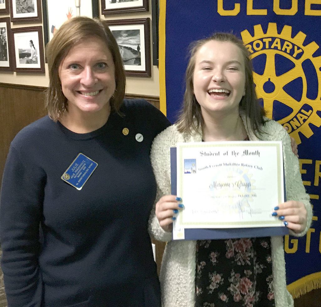 South Everett-Mukilteo Rotary Club President-elect Julie Frauenholtz presents Kamiak High School senior Mary Craggs with a Student of the Month award. (Contributed photo)

