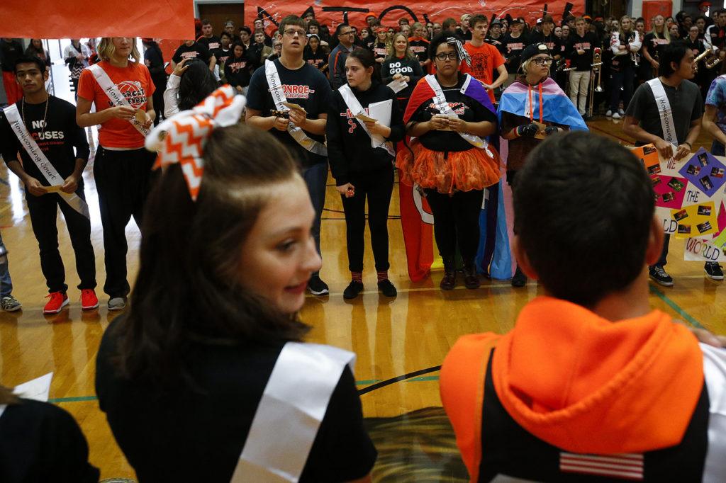 Homecoming nominees from various Monroe High School teams and clubs line up during an assembly Friday morning in the school’s gymnasium. Bucking the usual school homecoming trends, Monroe High School opted to nominate students from organizations ranging from football to chess club. (Ian Terry / The Herald)
