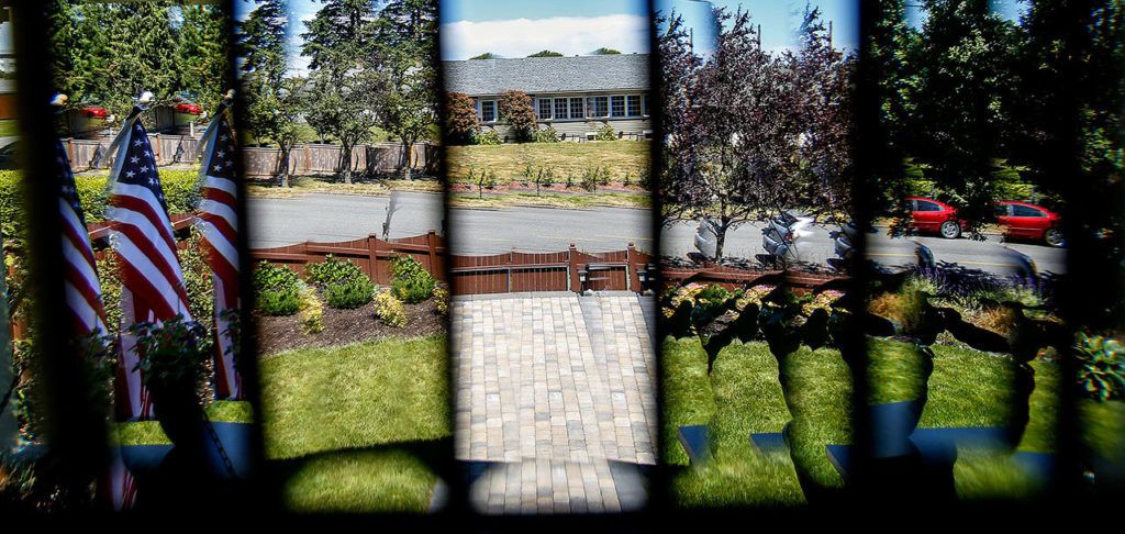A prismatic view through the Keenans’ beveled front door glass reveals an attractive entry walk in multiples. (Dan Bates / The Herald)
