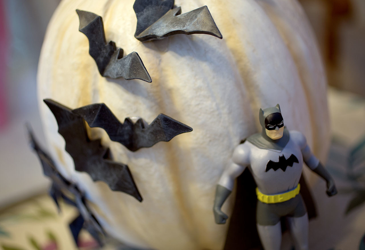Bats and a Batman figure decorate a pumpkin at Ogaard’s home. (Andy Bronson / The Herald)
