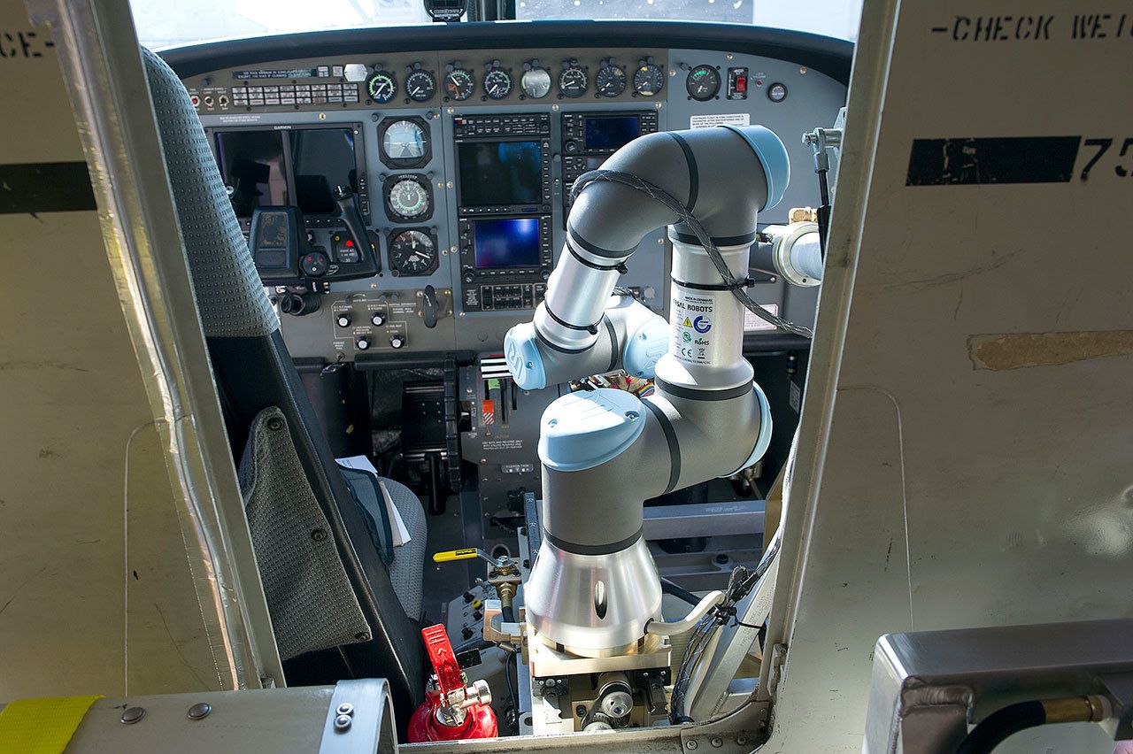 Aurora Flight Sciences’ Aircrew Labor In-Cockpit Automantion System (ALIAS) is mounted in the co-pilot seat of a Cessena Caravan aircraft at Manassas Airport in Manassas, Virginia, on Monday. (Cliff Owen / Associated Press)