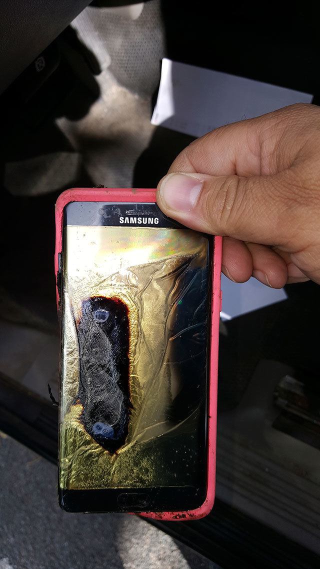 This Friday photo provided by Andrew Zuis, of Farmington, Minnesota, shows the replacement Samsung Galaxy Note 7 phone belonging to his 13-year-old daughter Abby, that melted in her hand earlier in the day. (Andrew Zuis via AP)