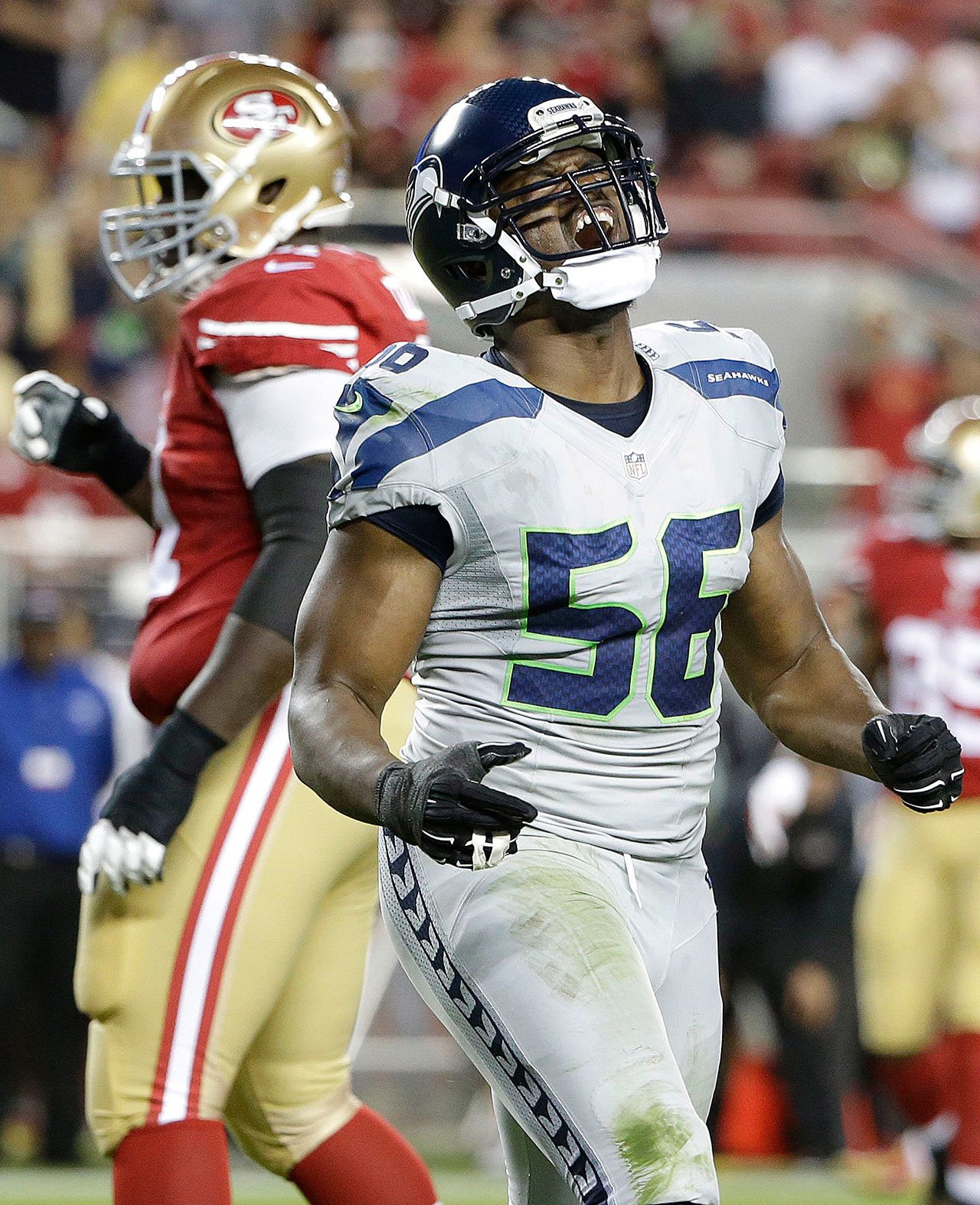 Seahawks defensive end Cliff Avril (56), seen here during a game against the 49ers last season in Santa Clara, Calif., was named the NFL Defensive Player of the Month for October on Thursday. (AP Photo/Marcio Jose Sanchez)