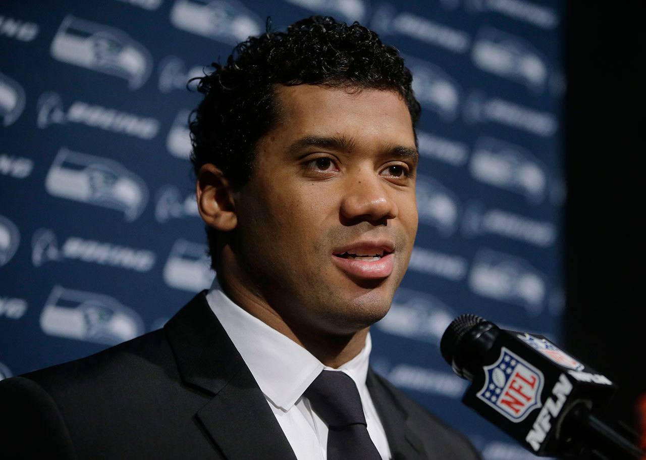 Seahawks quarterback Russell Wilson speaks to the media following a game against the Patriots on Nov. 14 in Foxborough, Mass. (AP Photo/Steven Senne)