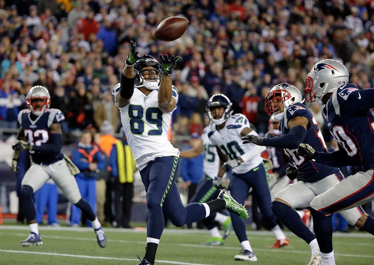 Seattle Seahawks wide receiver Doug Baldwin (89) catches a pass for his third touchdown of the game during the second half of an NFL game Sunday against the New England Patriots. (AP Photo/Steven Senne)
