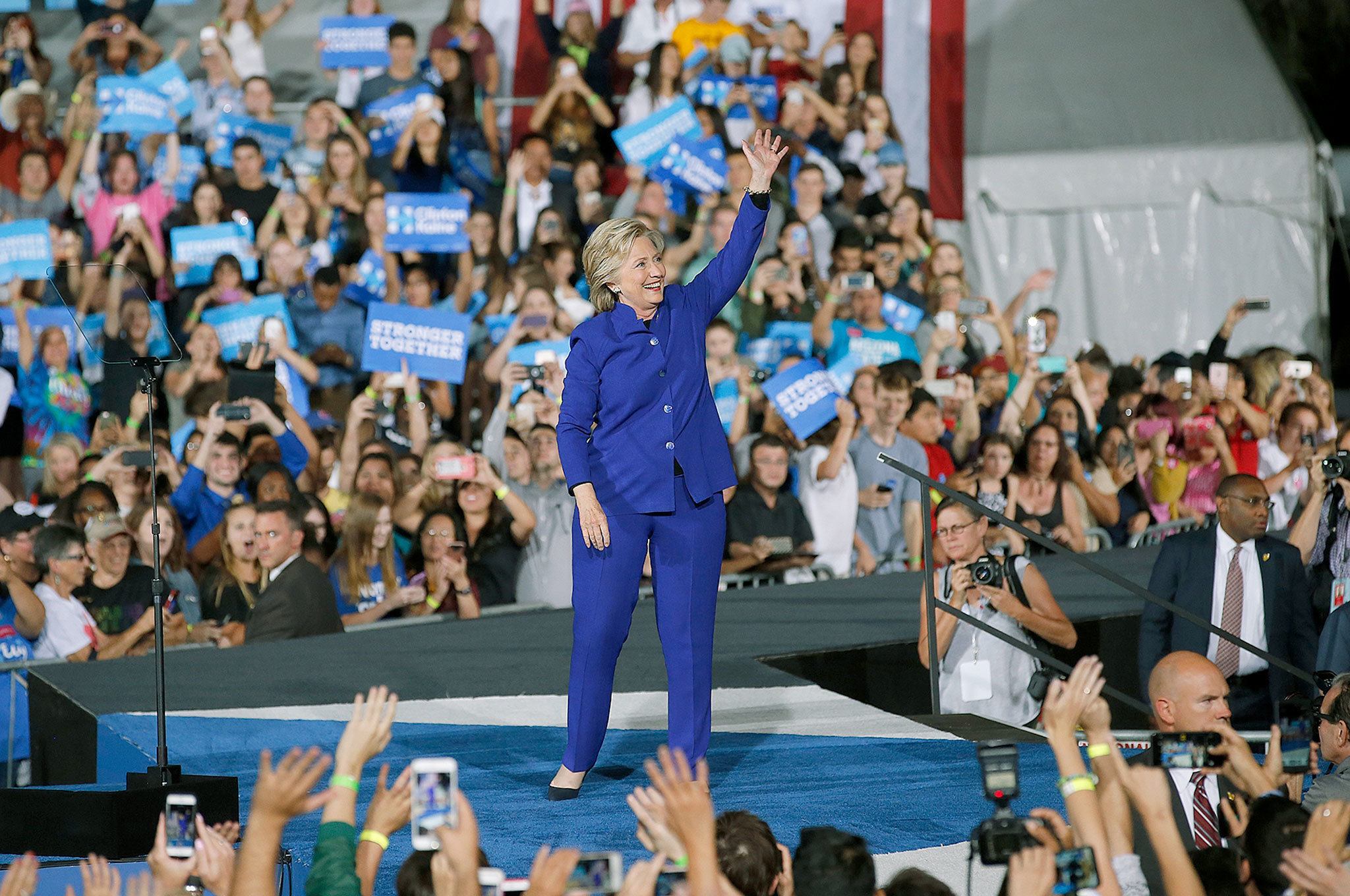 Democratic presidential candidate Hillary Clinton waves to supporters as she arrives at a campaign rally Wednesday in Tempe, Arizona. (AP Photo/Ross D. Franklin)