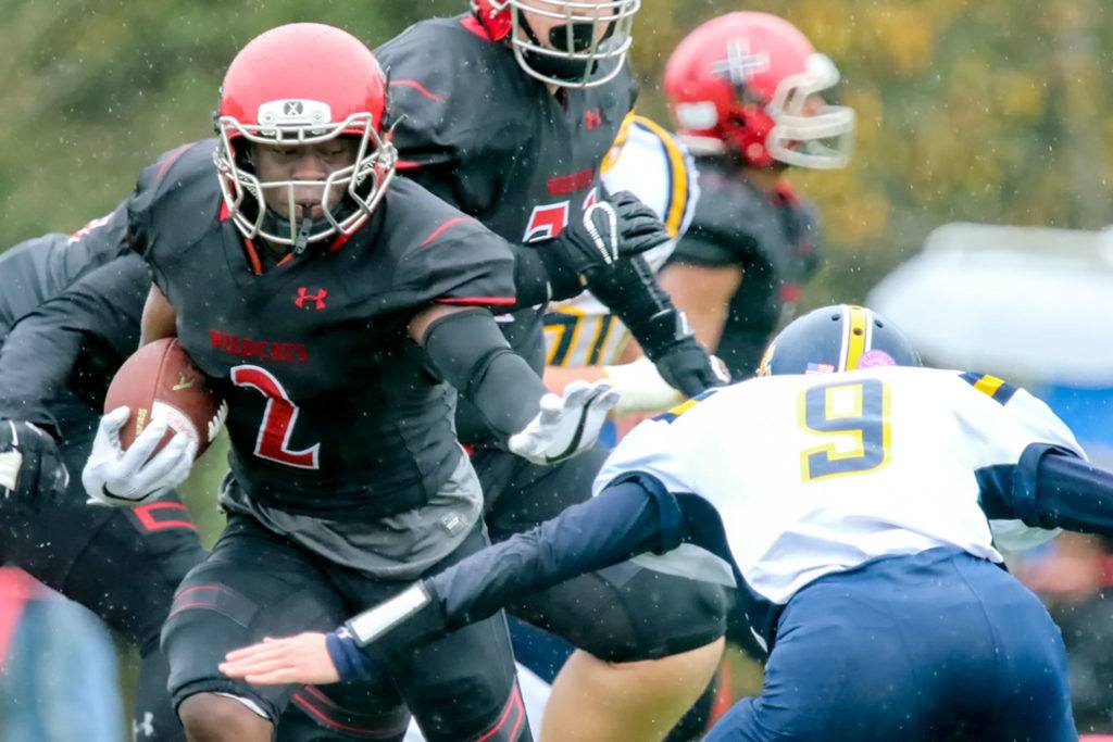 Archbishop Murphy’s Emmanuel Osuoha rushes for additional yards with Burlington-Edison’s Hunter Anderson closing Saturday afternoon at Terry Ennis Stadium on November 5, 2016. (Kevin Clark / The Herald)