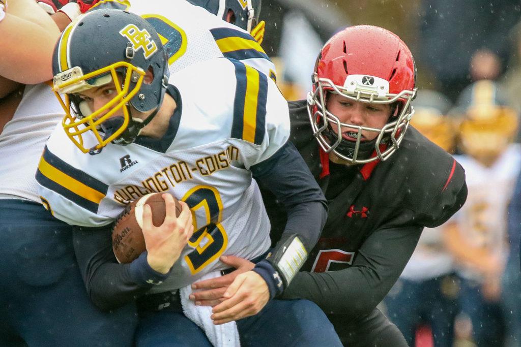 Burlington-Edison’s Hunter Anderson is tackled by Archbishop Murphy’s Luke Riojas Saturday afternoon at Terry Ennis Stadium on November 5, 2016. (Kevin Clark / The Herald)