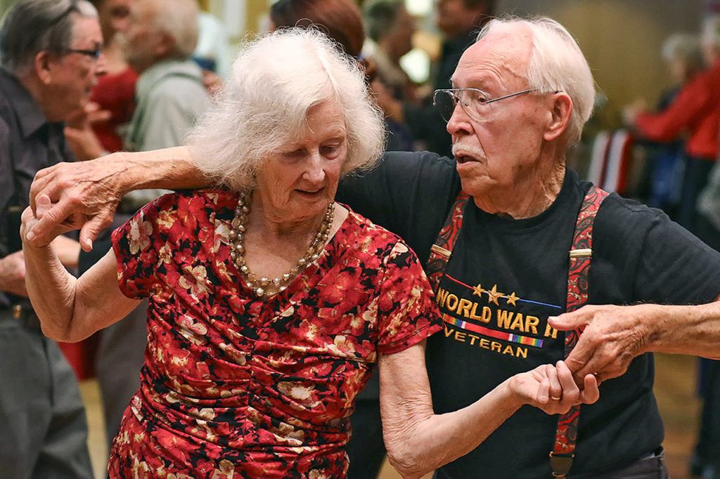 Anne and Pershing Beglau dance during the annual Veteran’s Day Dance at Carl Gipson Senior Center in Everett on Nov. 11. (Kevin Clark / The Herald)

