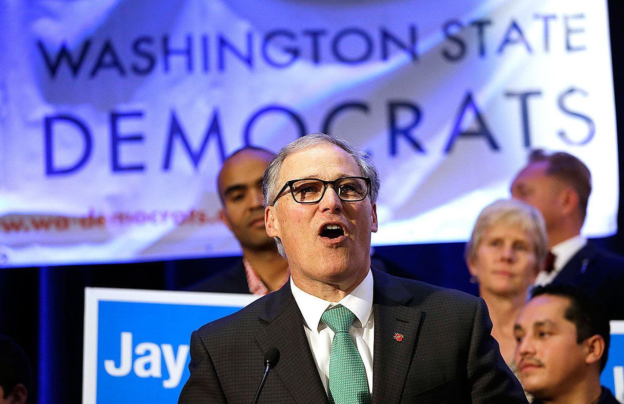 Gov. Jay Inslee speaks at an election night party for Democrats on Tuesday, Nov. 8, in Seattle. Inslee defeated Republican challenger Bill Bryant to win re-election. (AP Photo/Elaine Thompson)
