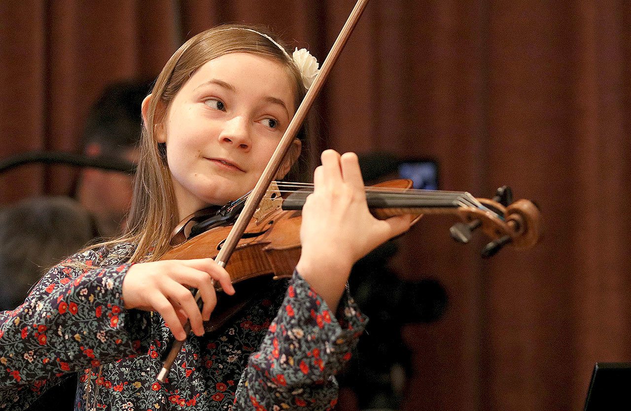 Alma Deutscher plays violin during a rehearsal in Vienna, Austria, on Thursday. (AP Photo/Ronald Zak)