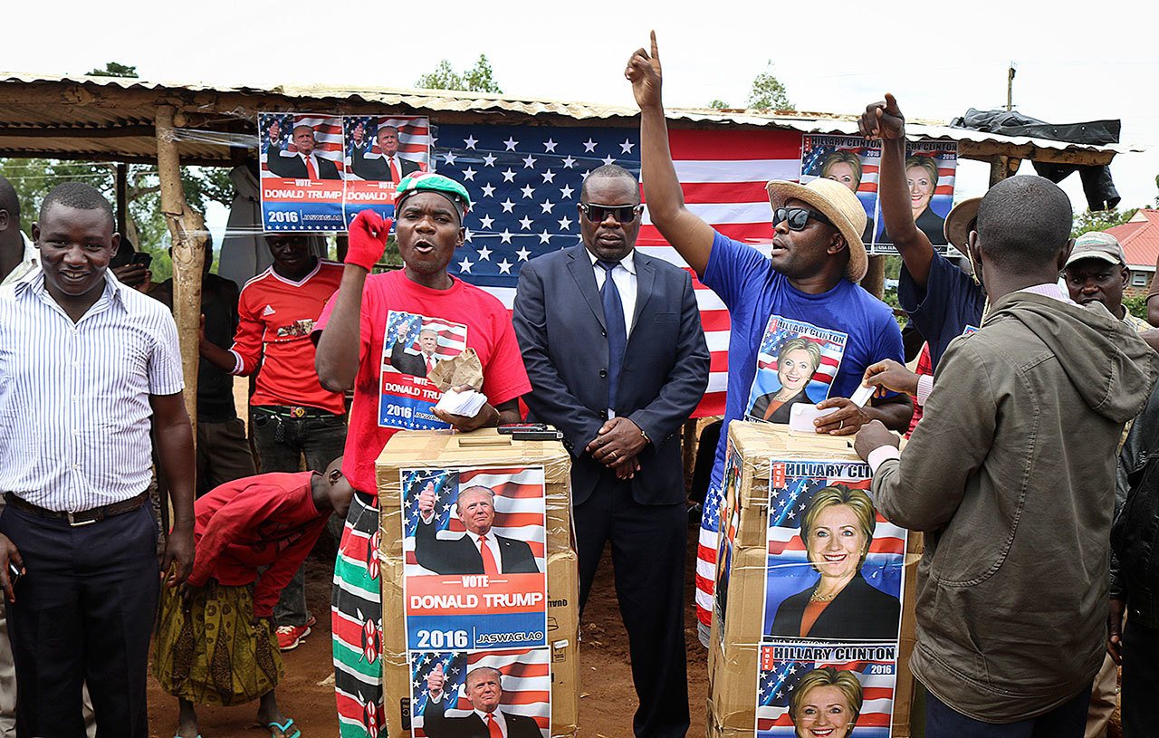 Comedians stage a mock election in the village of Kogelo, the home town of Sarah Obama, step-grandmother of President Barack Obama, in western Kenya, on Tuesday, Nov. 8. Residents of the town made famous by its association with President Obama cast their “votes” for either Hillary Clinton or Donald Trump, with Clinton winning according to an organizer. (AP Photo)