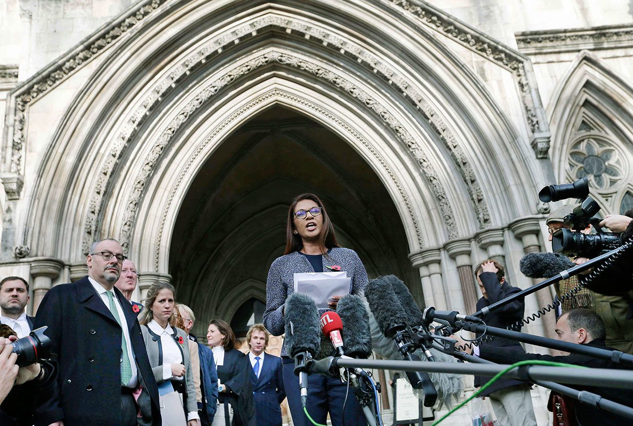 Business woman Gina Miller, one of the claimants who challenged plans for Brexit, speaks to the media outside the High Court in London on Thursday Nov. 3. In a major blow for Britain’s government, the High Court ruled Thursday that the prime minister can’t trigger the U.K.’s exit from the European Union without approval from Parliament. (AP Photo/Tim Ireland)