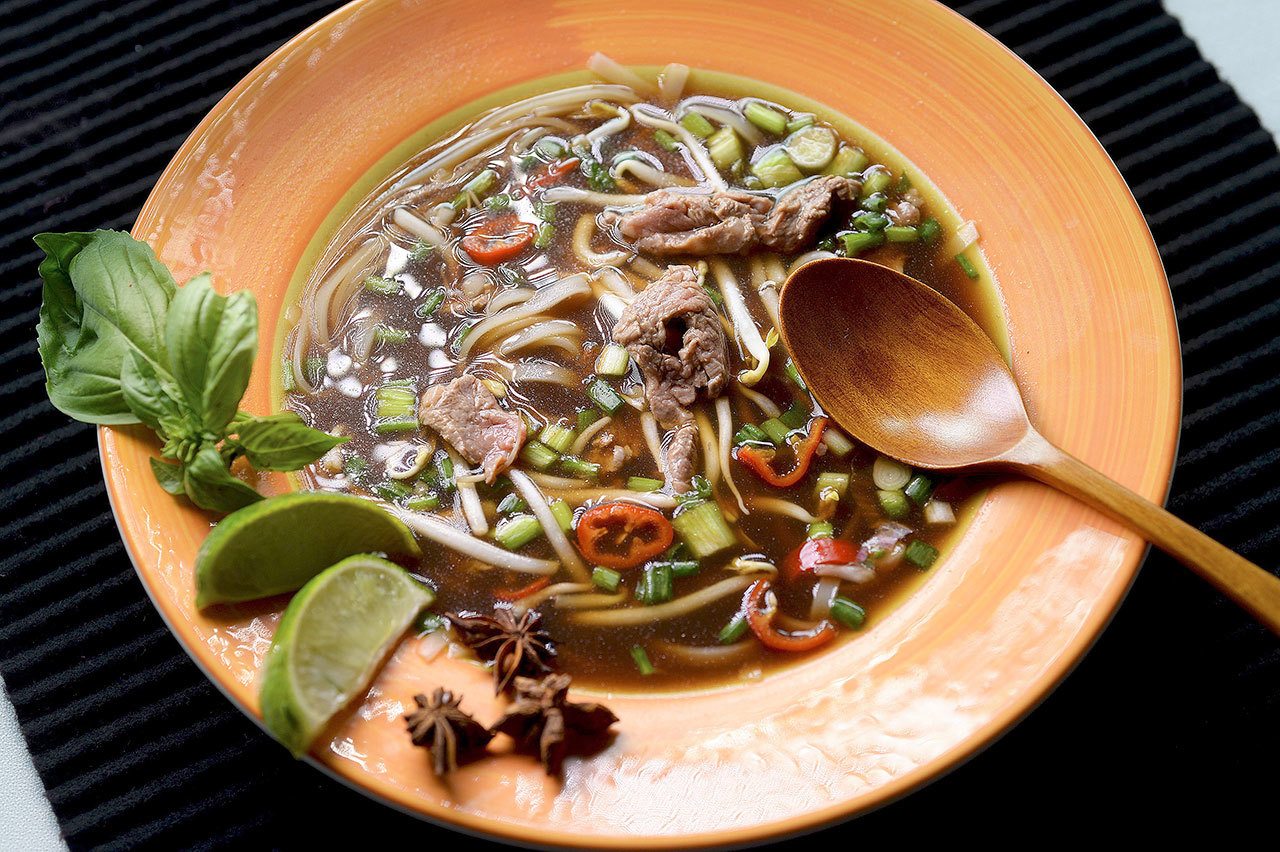 A quick version of beef pho is easy to put together because the steak cooks in minutes. (Diedra Laird / Charlotte Observer)