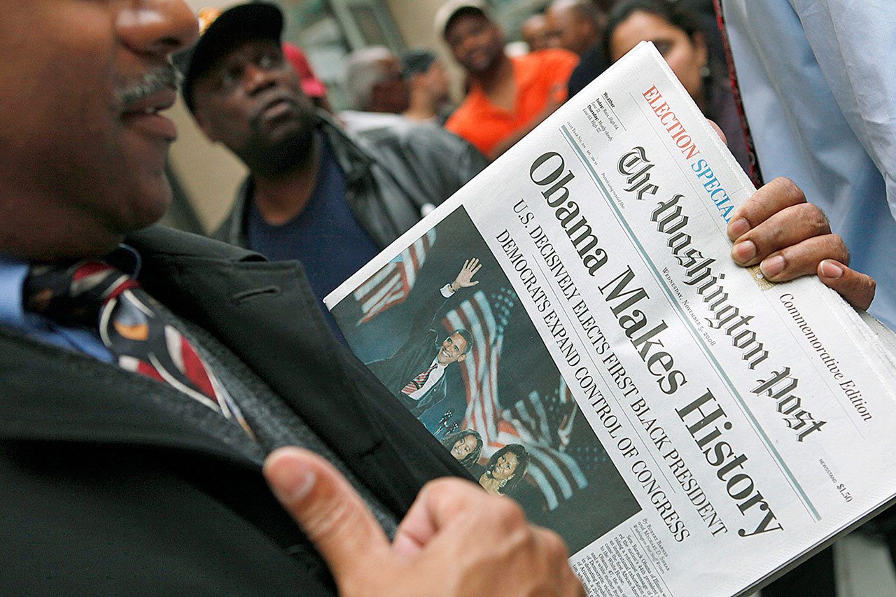 People line up outside of the Washington Post newspaper to purchase special election editions in Washington, D.C., on Nov. 5, 2008. Newspapers are printing extra copies and setting up temporary retail stands after recalling the frenzy for an ink-stained memento after Barack Obama&rsquo;s historic win in 2008. Many people now rely on Facebook and apps for news, but a screenshot doesn&rsquo;t have quite the same romance as a newspaper&rsquo;s front page. (AP Photo/Haraz N. Ghanbari, File)