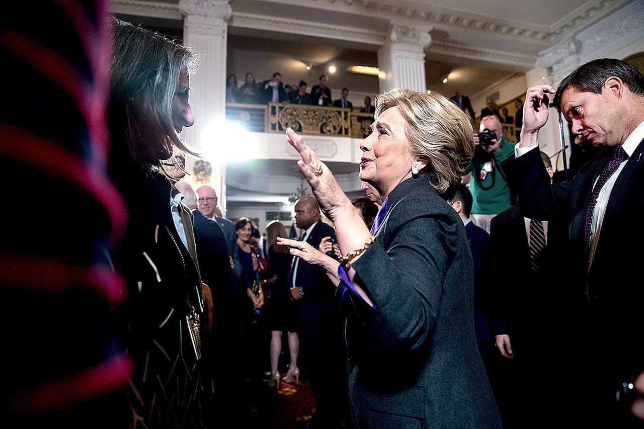 Democratic presidential candidate Hillary Clinton greets supporters after speaking at the New Yorker Hotel in New York on Wednesday, Nov. 9, where she conceded her defeat to Republican Donald Trump after the hard-fought presidential election. (AP Photo/Andrew Harnik)