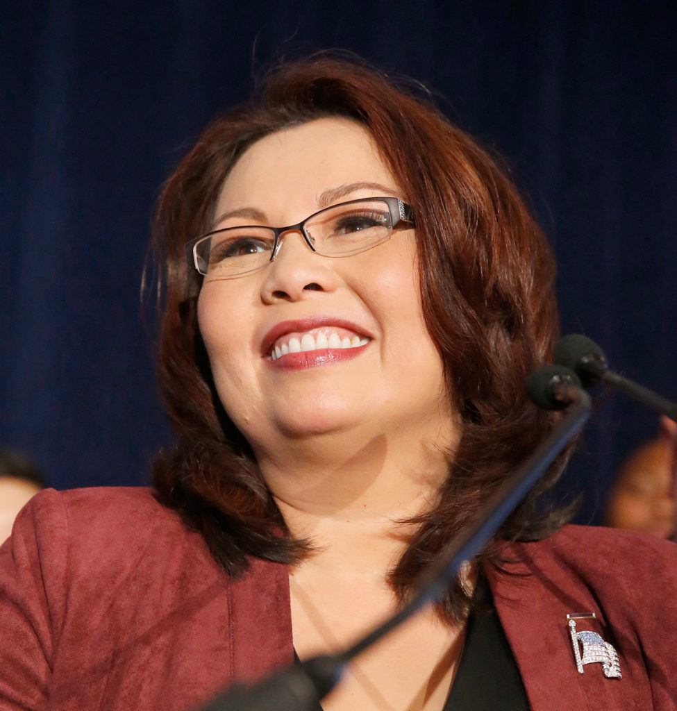 Sen.-elect Tammy Duckworth, D-Ill., smiles as she celebrates her win over incumbent Sen. Mark Kirk during her election night party Tuesday, Nov. 8, in Chicago. (AP Photo/Charles Rex Arbogast)

