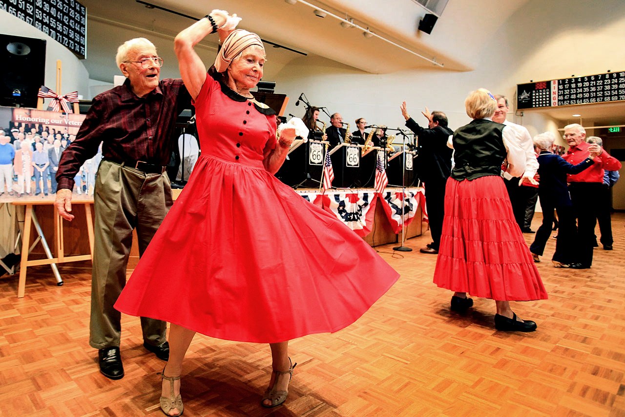 Ed Mueller (left) and Margarita Andrijic dance during the annual Veteran’s Day Dance at Carl Gipson Senior Center in Everett on Nov. 11. (Kevin Clark / The Herald)