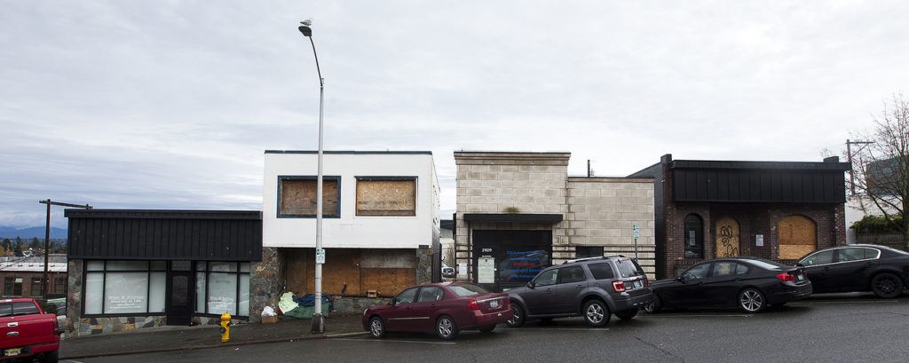 The buildings have been abandoned since the county took hold of the block with plans, since canceled, to build a new courthouse. (Ian Terry / The Herald)
