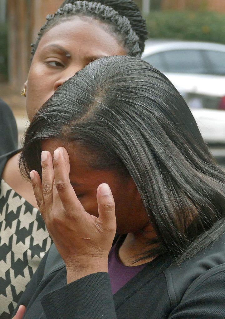 Rakeyia Scott, widow of Keith Lamont Scott, reacts during a news conference after the family met with Mecklenburg County District Attorney Andrew Murray on Wednesday, Nov. 30, in Charlotte. Murray announced that the shooting by officer Brent Vinson was justified. Vinson, who is black, shot and killed Keith Lamont Scott on Sept. 20. (Davie Hinshaw/The Charlotte Observer via AP)
