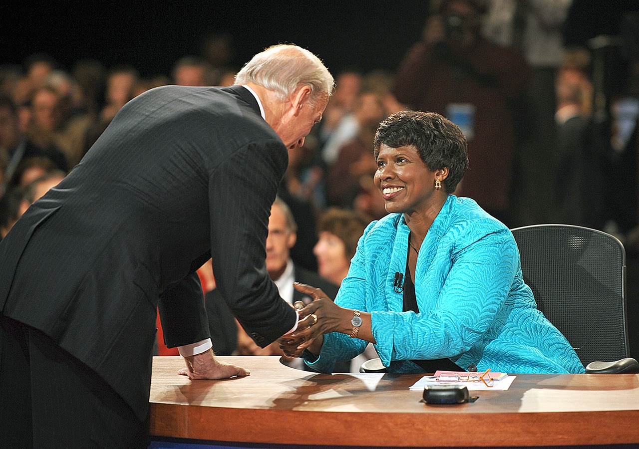 In this Oct. 2, 2008, photo, PBS journalist and debate moderator Gwen Ifill and then-Democratic vice presidential nominee, Sen. Joe Biden, D-Del., shake hands at the end of his vice presidential debate with Republican rival, Alaska Gov. Sarah Palin, in St. Louis, Missouri. Ifill died Monday, Nov. 14, of cancer, PBS said. She was 61. (AP Photo/Don Emmert, File Pool)