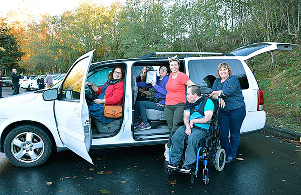Members of Young Life Capernaum Snohomish County settle into their new van, a surplus vanpool vehicle donated by Community Transit through its competitive grant program, Van GO. (Contributed photo)
