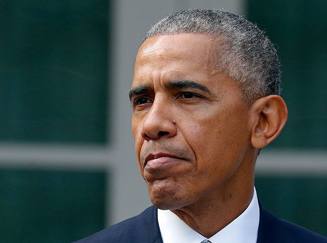 In this Nov. 9 photo, President Barack Obama pause while speaking in the Rose Garden of the White House in Washington. (AP Photo/Pablo Martinez Monsivais)