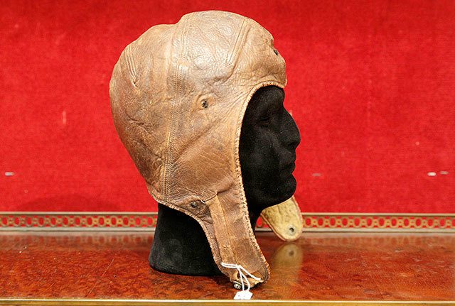 The leather cap of Captain Charles Lindbergh is pictured at the Drouot auction house, Wednesday, Nov.16, in Paris. Lindbergh wore the aviation cap during his famous 33-hour transatlantic flight in 1927 from New York to Paris. (AP Photo/Christophe Ena)