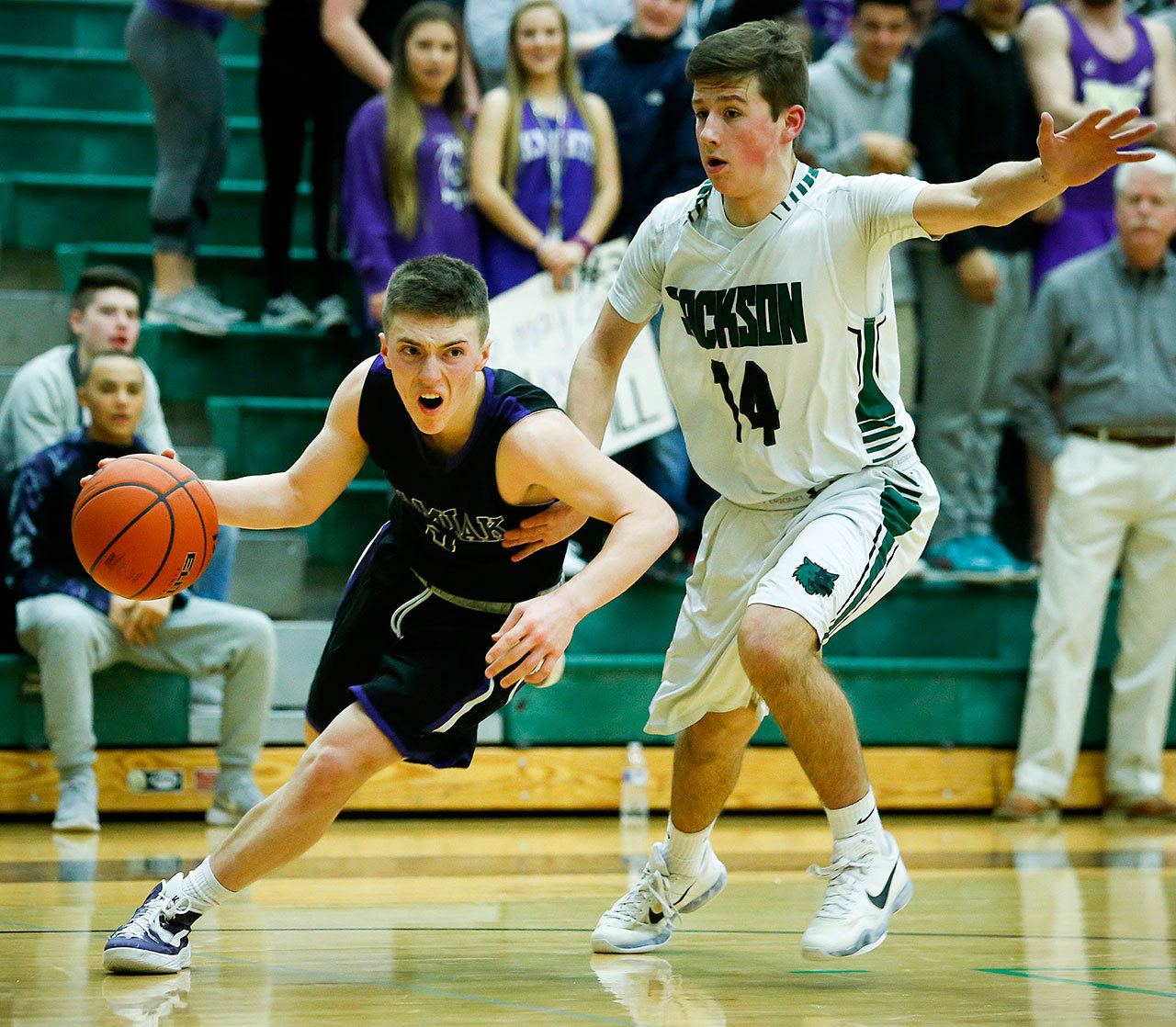 Kamiak guard Carson Tuttle (left) averaged 15.7 points and 6.0 assists per game last season as a sophomore. (Ian Terry / The Herald)