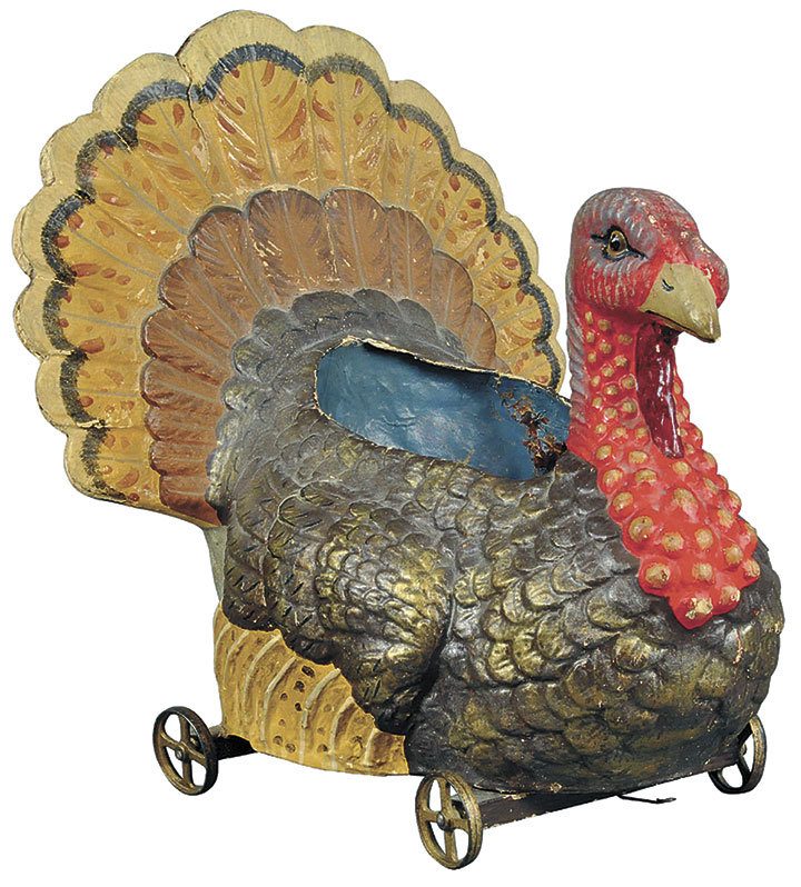 No, the large turkey was not made as a Thanksgiving decoration. It is an antique part for a game of skittles that sold at auction for more than $2,000. But it would look great on the holiday dinner table. (Cowles Syndicate Inc.)