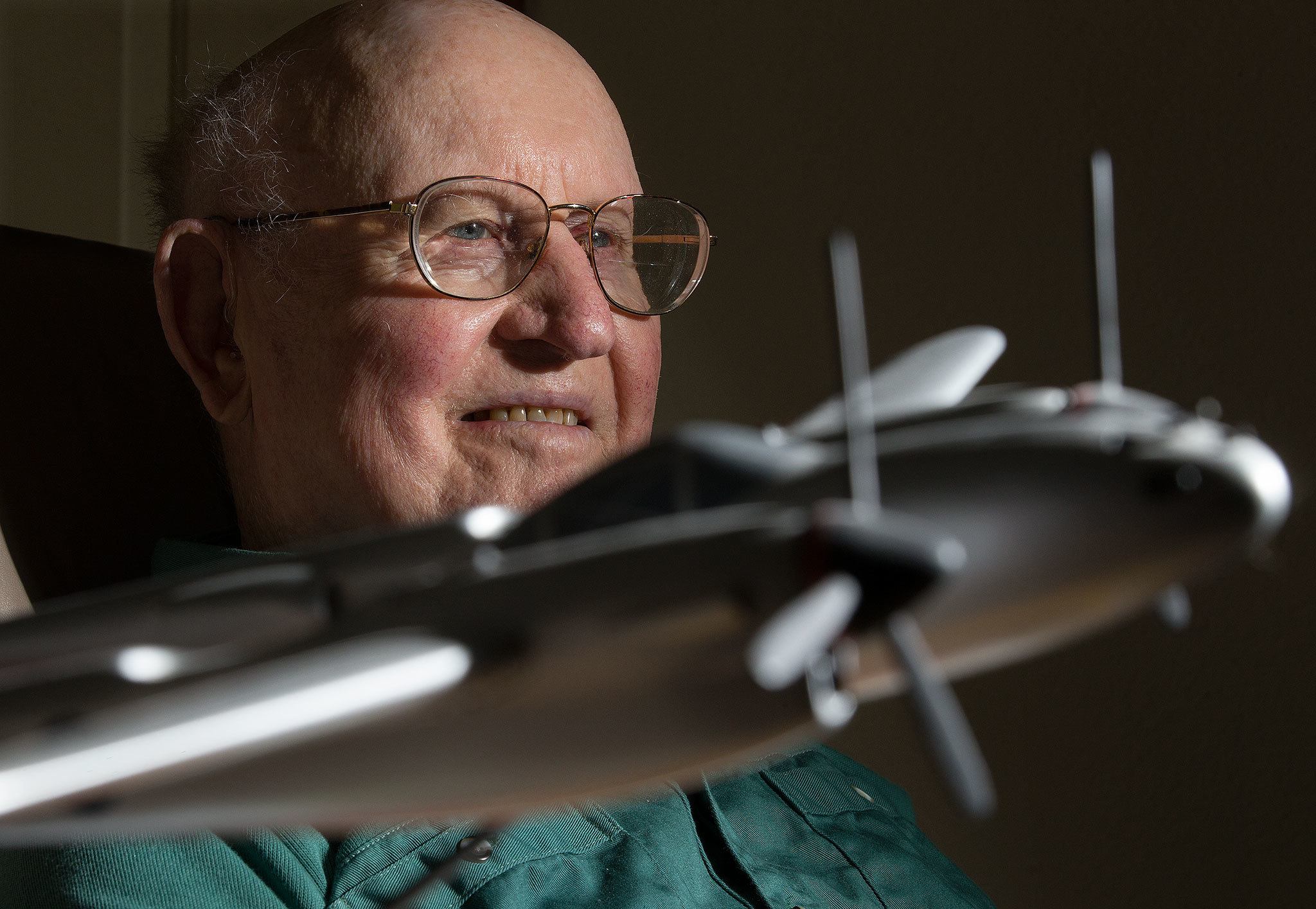Stanwood resident Bob Jones, 92, recounts bailing out of his P-38 fighter plane as an Army Air Corps pilot in World WarII. He escaped twice while captured, spent time in Stalag Luft 1 and was listed as killed in action. He was already in Texaswhen he called his parents to tell them he was alive. (Andy Bronson / The Herald)
